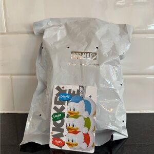 Heat, Dewey, and Louie PopMart Keychain (unopened)